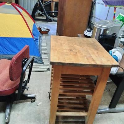 Red 1960's office chair, butcher block Island with casters, 1970s teachers desk