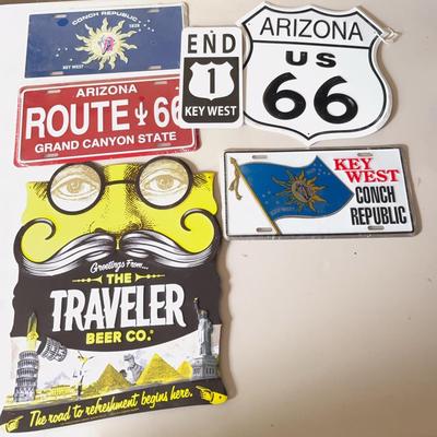 Assortment of Collectible Metal Travel Signs