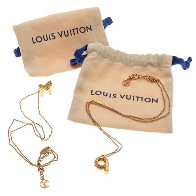 Pair of Louis Vuitton Gold-Tone "LV & Me" Letter Necklaces
