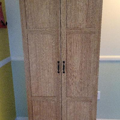 TALL STORAGE CABINET WITH ADJUSTABLE SHELVING