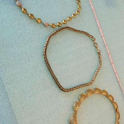 Assorted costume gold tone necklaces