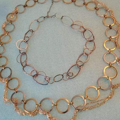 Chain belt and necklace.