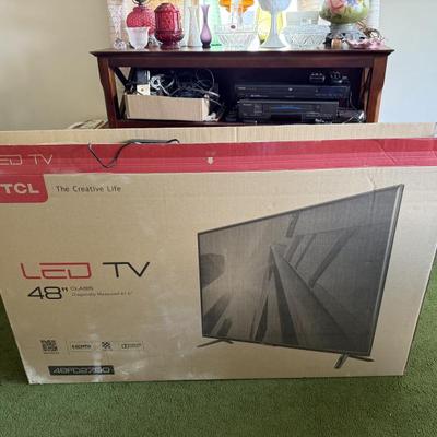 Very lightly used in box flatscreen TV