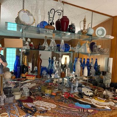 Variety of glass items and jewelry