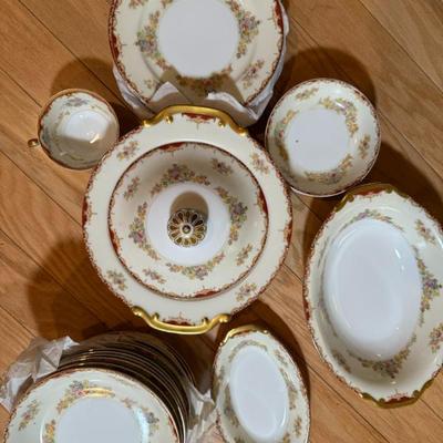 Fine China. Set for 12 with plates, bread plates, bowls, etc. and many serving dishes