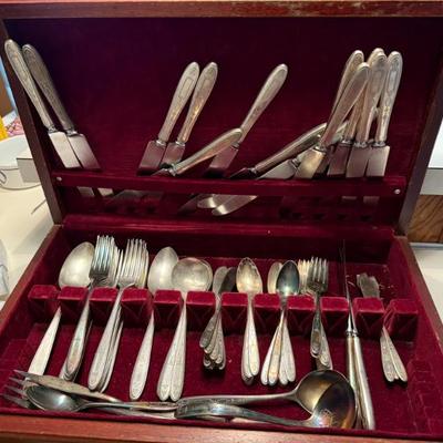 Silverware set for 12 (monogramed “K”)