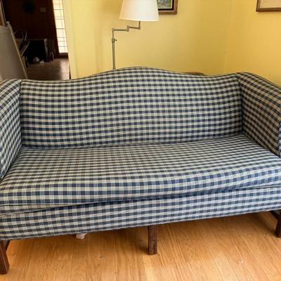 Blue and white loveseat