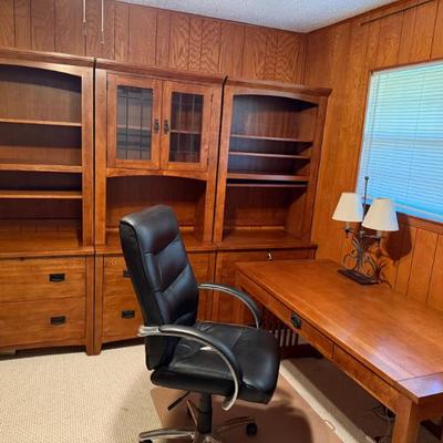 ome office set: 2 open bookshelves with lower (file) drawers, 1 bookshelf upper shelves with glass doors, and matching desk. Black office...