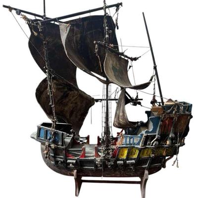 Miniature Ship Model with Sails and Rigging