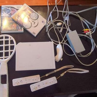 Nintendo Wii System with 4 Games – Family Fun Ready!