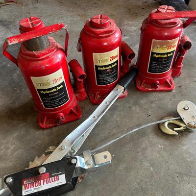 3  20Ton Hydraulic Jacks And A 4000lb Capacity Winch Puller
