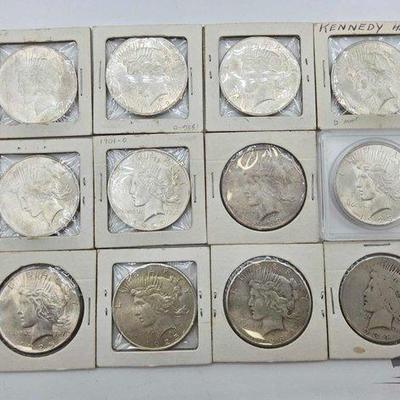 #1409 • (12) 1922-1934 P Mint Silver Peace Dollars
