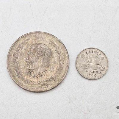 #1810 • (2) Foreign Currency Coins
