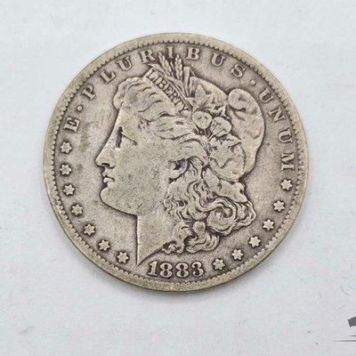 #1306 • 1883 Carson City Morgan Silver Dollar
