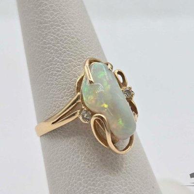 #566 • 14k Gold Opal and Diamond Ring, 2.5g
