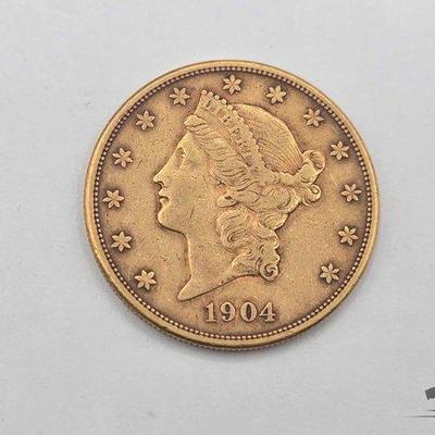 Sale Photo Thumbnail #121: #1004 • 1904 $20 Double Eagle Gold Coin, 1.18oz
