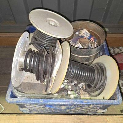 #10606 • Spools of Wire and Spark Plugs
