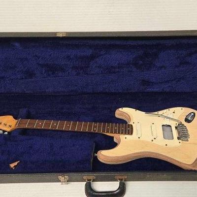 #2938 • Guitar with Case
