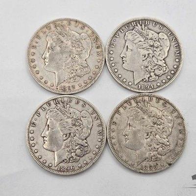 #1338 • (4) Morgan Silver Dollars
