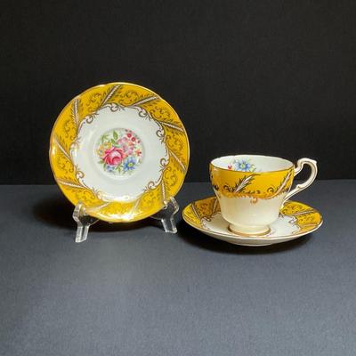 Vintage Paragon Tea Cup And Two Saucers