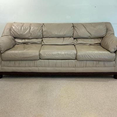Tan Leather Couch With Carved Wood Trim And Legs  