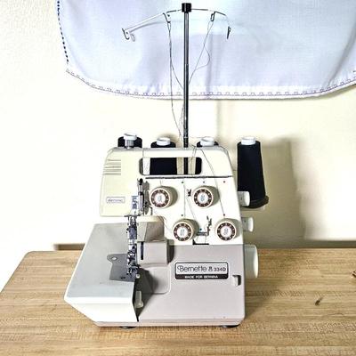 Lot #17 - Bernina Bernette SERGER Sewing Machine 334D with Booklet, Cover, and Additional Thread