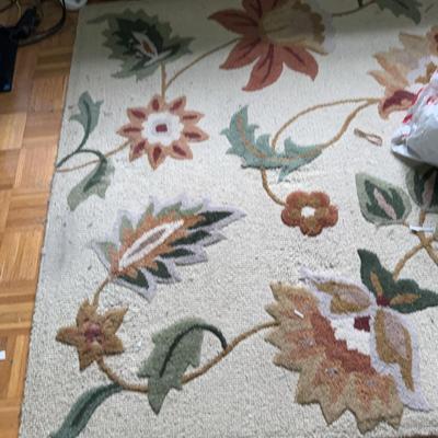 Off-White Area Rug With Flower Design