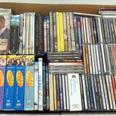 1136	LARGE GROUP OF ASSORTED CD'S AND DVD'S
