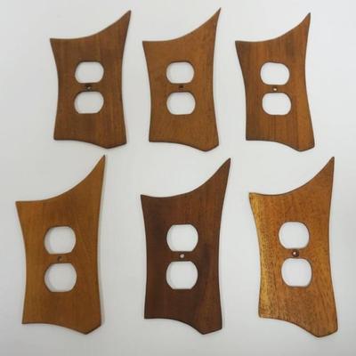 1036	6 VINTAGE UNUSUAL MIDCENTURY MODERN STREAMLINE TEAK DUPLEY WALL SOCKETS PLATE COVERS, EACH APPROXIMATELY 8 IN X 3 1/4 IN
