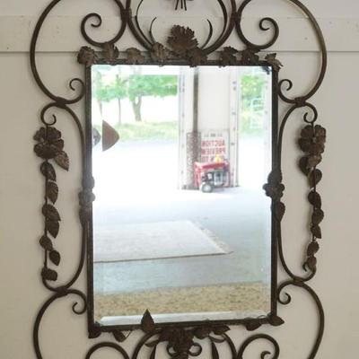 1265	BEVELED GLASS HANGING MIRROR IN FANCY WROUGHT IRON FRAME, APPROXIMATELY 31 IN X 47 IN
