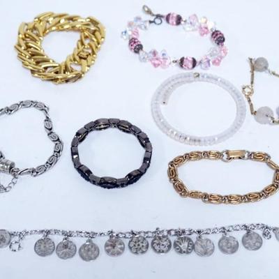 1171	8 LADIES BRACELETS INCLUDING MONET
