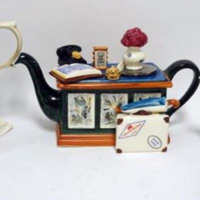1117	GROUP OF ORNAMENTAL TEA POTS, LARGEST APPROXIMATELY 12 IN X 7 IN X 9 IN H
