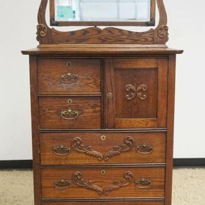 1254	ANTIQUE BONNET CHEST HAVING 5 DRAWERS AND 1 DOOR, MIRROR TOP WITH APPLIED CARVINGS ON DRAWER FRONTS, APPROXIMATELY 34 IN X 20 IN X...