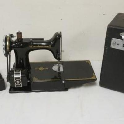 1097	SINGER FEATHER WEIGHT SEWING MACHINE IN BOX W/ATTACHMENTS, APPROXIMATELY 13 IN X 8 IN X 17 IN HIGH

