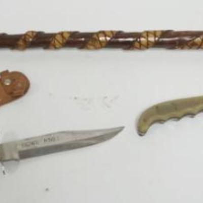 1059	2 KNIFES W/SHEATHS & WALKING STICK W/CARVED SNAKE, WALKING STICK APPROXIMATELY 37 IN LONG
