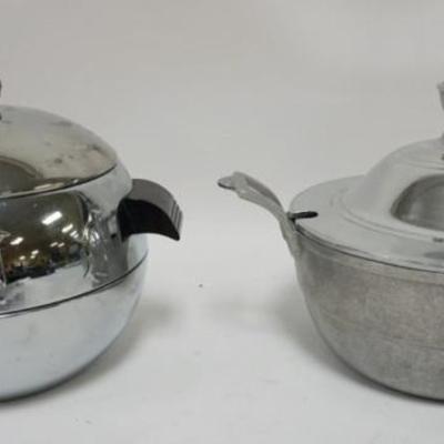 1124	WEST BEND COVERED PENGUIN AND WILTON ALUMINUM COVERED POT, LARGEST PIECE APPROXIMATELY 11 IN X 8 IN H
