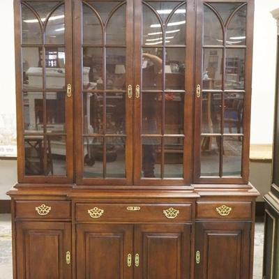 1202	STATTON MAHOGANY 2 PC BREAKFRONT WITH ADJUSTABLE GLASS SHELVES AND INTERIOR LIGHTS, APPROXIMATELY 61 IN X 16 IN X 83 IN H
