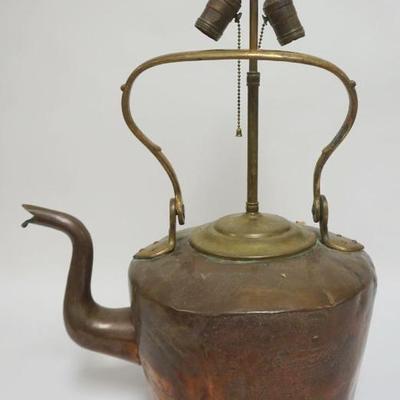 1075	LARGE ANTIQUE COPPER & BRASS TEA KETTLE MODIFIED INTO A TABLE LAMP, APPROXIMATELY 24 IN HIGH
