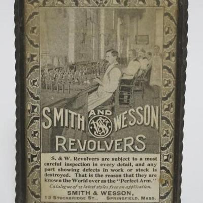 1082	ANTIQUE SMITH & WESSON REVOLVERS ADVERTISING POCKET MIRROR, APPROXIMATELY 3 IN X 5 IN
