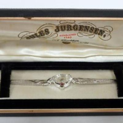 1166	JULES JURGENSEN 14K WHITE GOLD AND 4 DIAMOND BRENDA LADIES WATCH IN ORIGNAL PACKAGING, 9.7DWT
