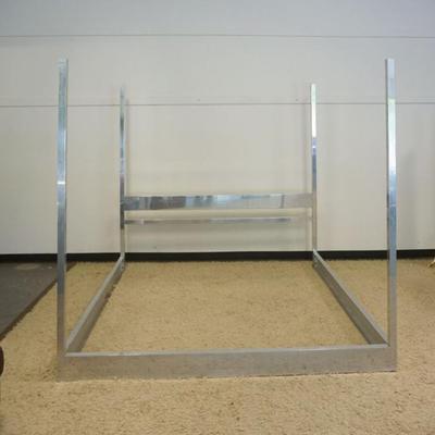 1183	CHROME MODERN STYLE POSTER BED, HOLLYWOOD FRAME FITS INSIDE, NOT INCLUDED, APPROXIMATELY 84 IN X 86 IN X 79 IN H
