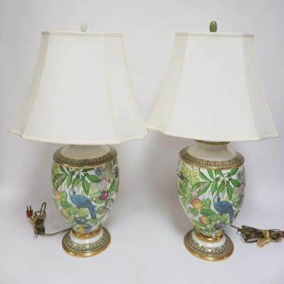 1009	PAIR OF ITALIAN PORCELAIN TABLE LAMPS W/IMAGES OF BIRDS, FLOWERS & VINES, EACH APPROXIMATELY 29 IN HIGH
