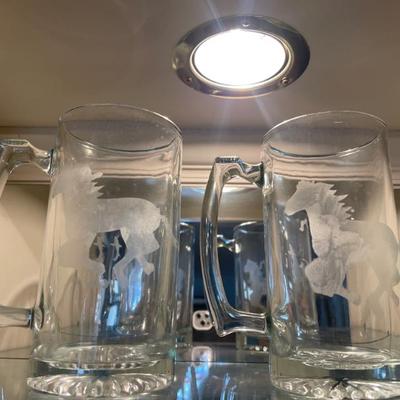 Etched horses on glass mugs 
