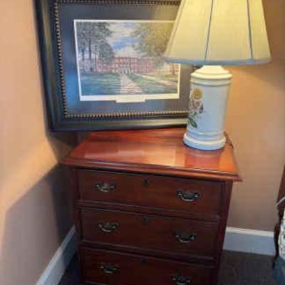 Craftique bedside table with art lamp
