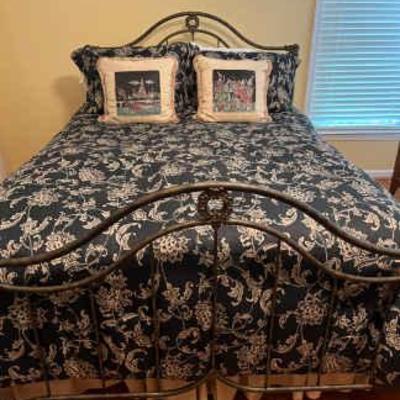 Queen metal bed with bedding