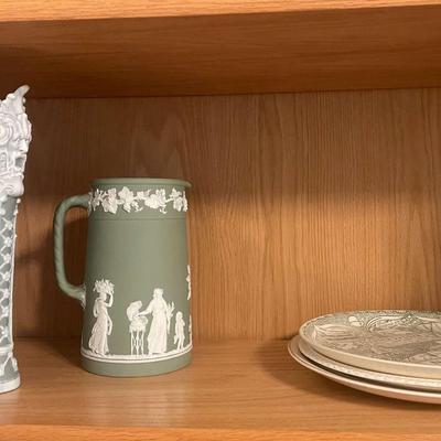Green and white colored ceramic vases 