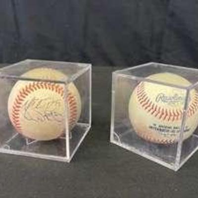 2 signed baseballs