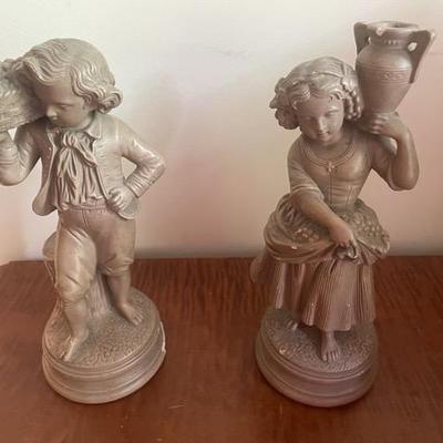 Two Decorative Children Statues