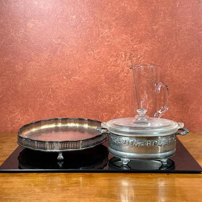 (3pc) Glass & Silver Plate Serve ware | Glass cocktail pitcher with glass stirrer: h. 10" Pyrex glass oval casserole dish with...