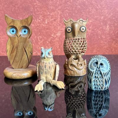 (4pc) Wooden Figures - Owls | Collection of wooden owl figures, including: Modern (21st c.) smooth carved owl on rounded base and blue...